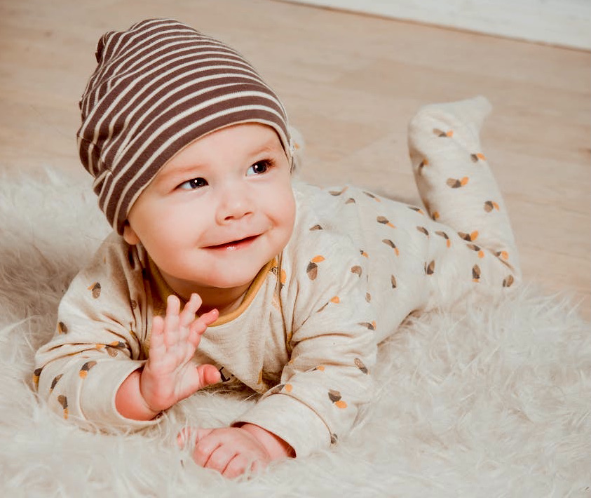 Baby communicating by waving